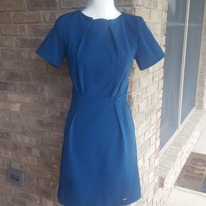 Kling beautiful teal dress in great condition, zip